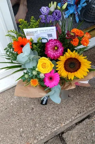 Sunflower and bright flowers in Welch wrapping