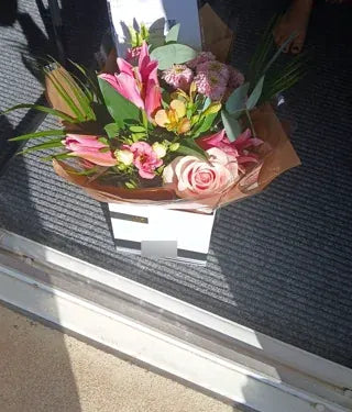 Pink roses in a Welch gift box