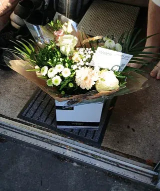 Cream flowers in a Welch gift box