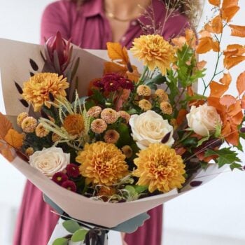 Beautiful autumn chrysanthemum bouquet with roses and foliage, perfect for Autumn celebrations. The Chrysanthemum Glow, an Autumn Bouquet from Welch the Florist | Next Day Flower Delivery UK Florist.