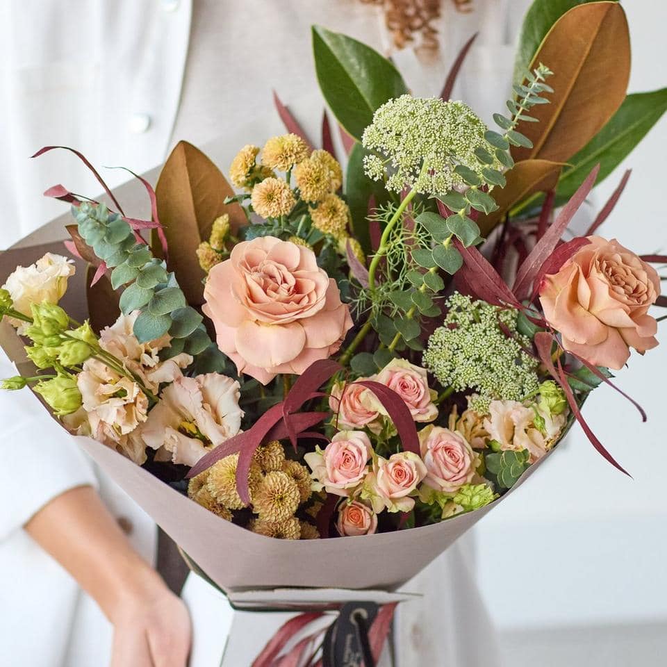 Beautiful mixed flower bouquet with roses, greenery, and textured blooms. The Enchanted Forest, an Autumn Bouquet from Welch the Florist | Next Day Flower Delivery UK Florist.