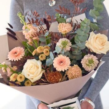 Beautiful mixed flower bouquet with roses, daisies, and eucalyptus leaves. The Dawn Dream, an Autumn Bouquet from Welch the Florist | Next Day Flower Delivery UK Florist.